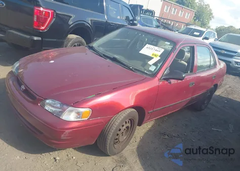 2000 Toyota Corolla Ce z USA, uszkodzony, nr VIN 2T1BR12E4YC314748